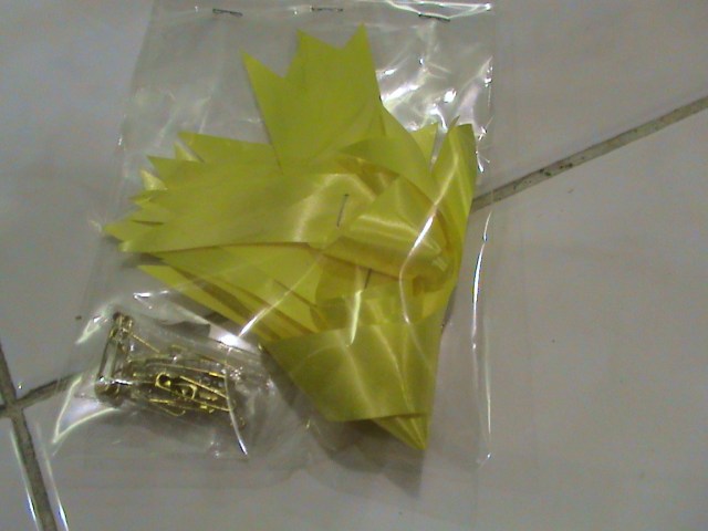 kode kostum pita kuning