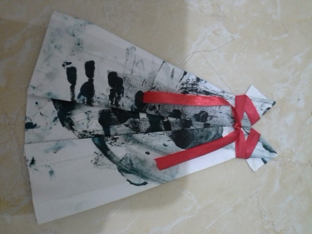 28. pada kertas lain, inilah hasil akhir yang sudah jadi, tampak depan