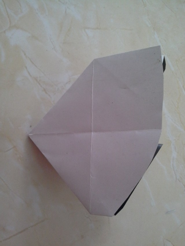 jika lipatan anda benar akan berbentuk seperti ini setelah dilipat