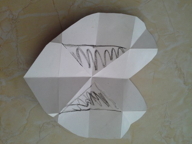 jika kartu saya buka kembali, maka daerah bolak balik yang perlu anda lem adalah daerah ini, namun anda tidak perlu membuka ataupun mengarsir kartu anda, cukup di lem bolak balik saja